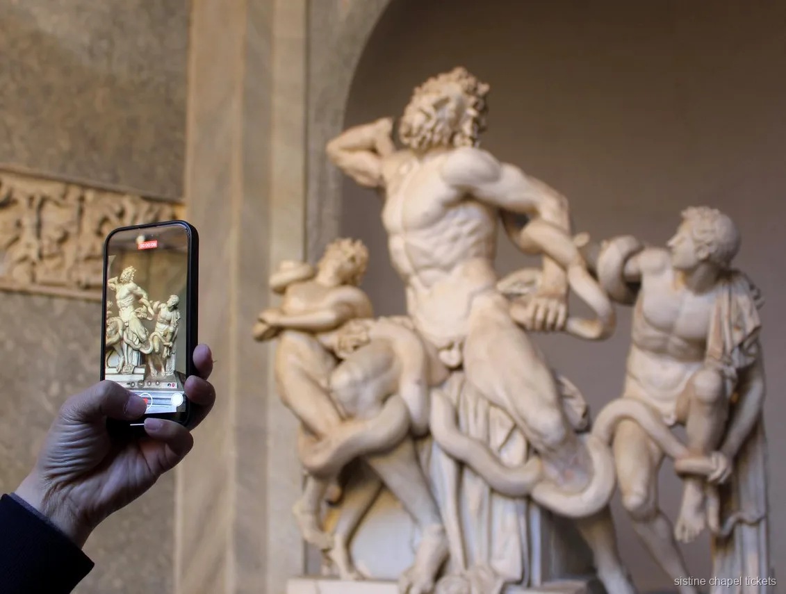 Host assisting visitors at the Vatican Museums entry ticket check-in